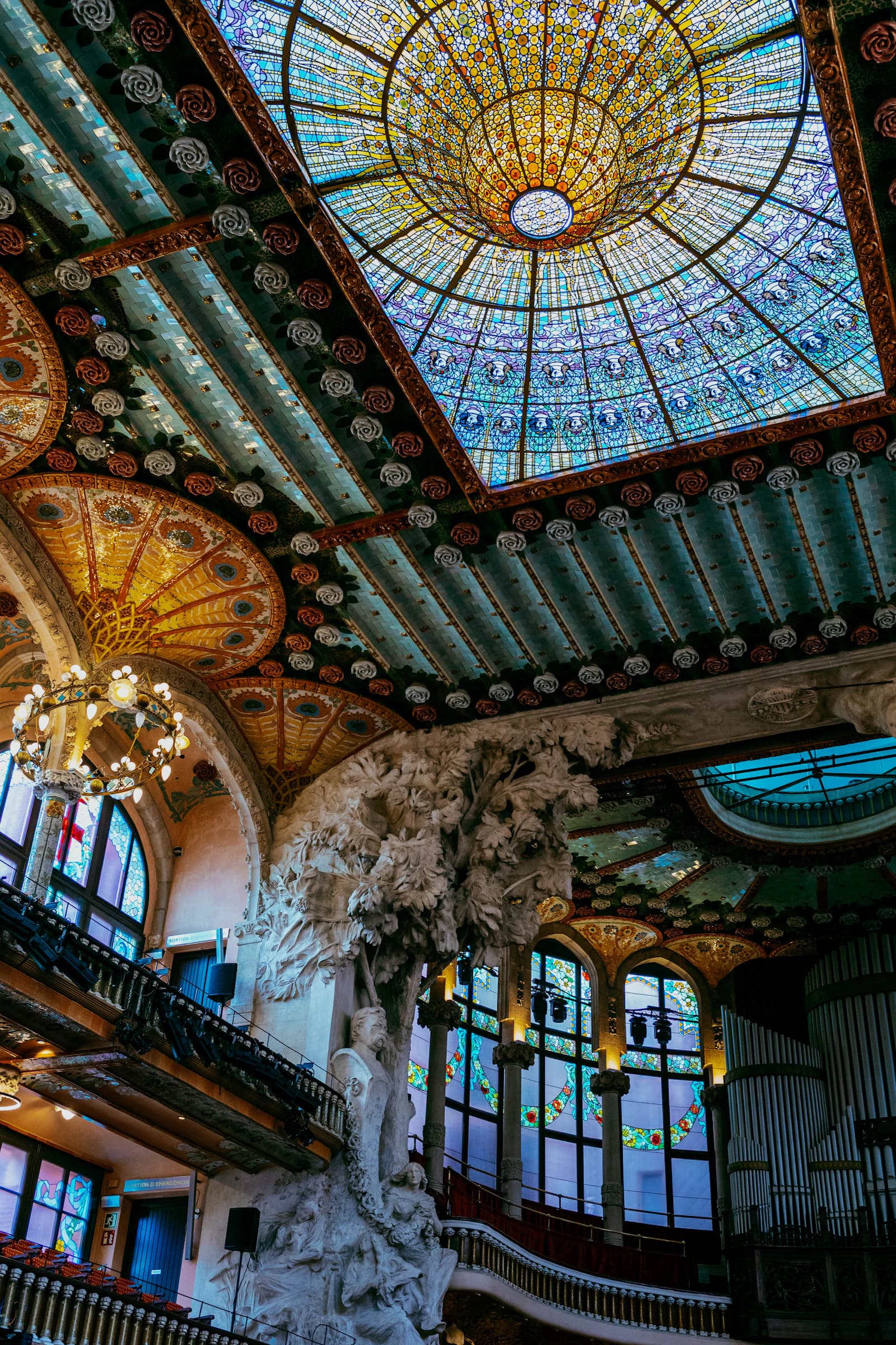 The ornate stained-glass skylight inside the Palau de la Música Catalana