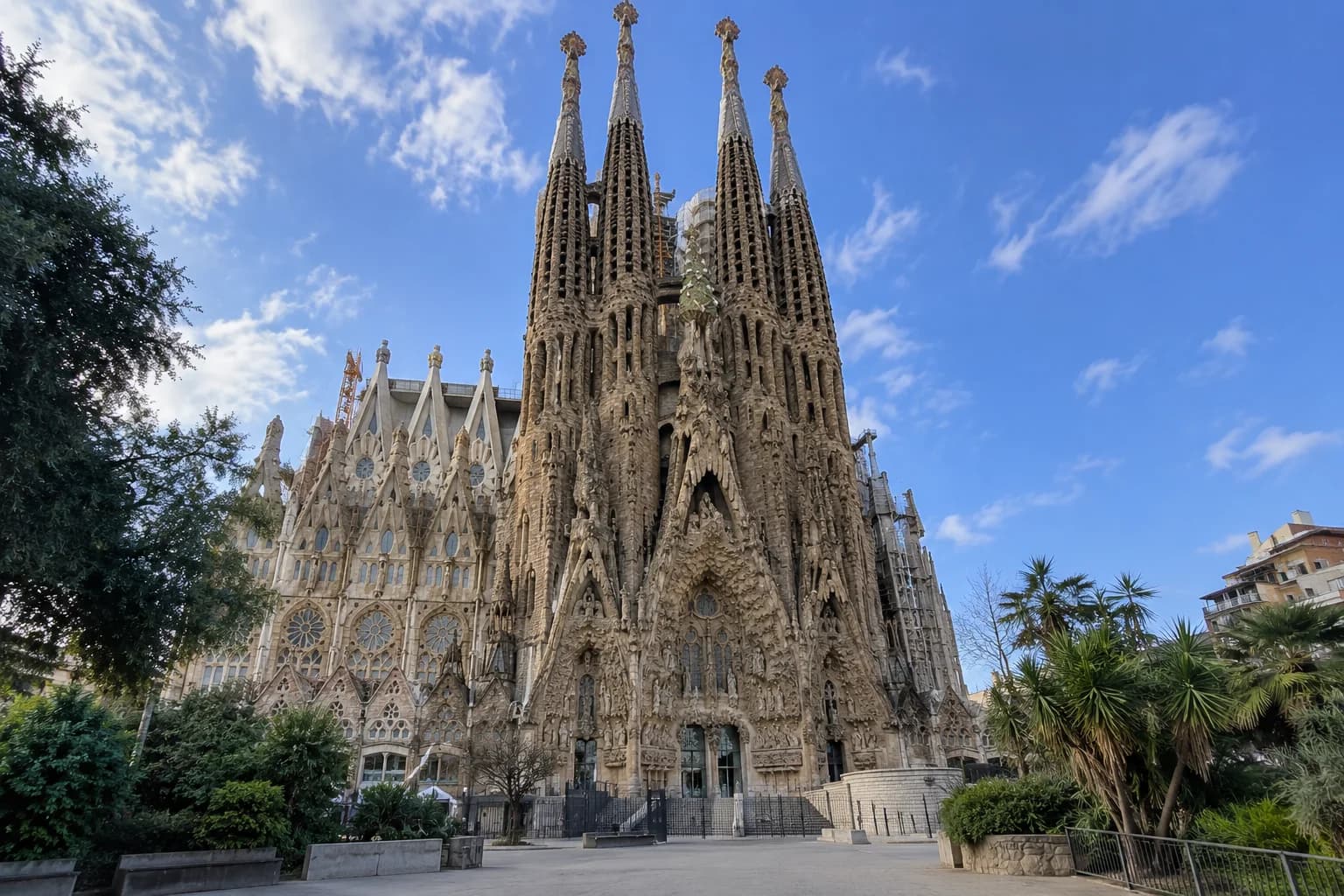Sagrada Família towers and sculpted façade in natural daylight